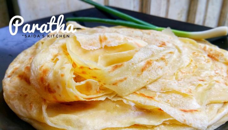 Ada tidak, bunda disini yang masih suka penasaran bagaimana sih bikinnya yang satu ini??.. Canai, roti Maryam, Paratha, apalagi sebutannya ya?? Kalau masih ada, berarti sama dengan saya bun 😊 Dari pertama saya cobain makan ini, langsung jatuh cinta. Tapi belum bisa membuatnya sendiri. Dan mungkin sudah puluhan kali saya coba membuatnya, tapi belum juga berhasil. Singkatnya, berapa bulan terakhir ini saya coba belajar bikin lagi bun. Alhamdulillah, akhirnya bisa juga. Dan ini urutan hasil percobaan terakhir saya. Dari yang keras, alot kalau sudah dingin, sampai akhirnya bisa lembut dan bisa bikin stok di kulkas. #MAAF banyak fotonya, maksimal 5 kan? itu foto berbeda ya bun. Hasil dari mulai belajar lagi sampai alhamdulillah bisa dikatakan berhasil. Ini resepnya ya bun.. Bahan A - 3 cup/ cangkir tepung cakra atau segitiga - 1sdt garam - 1 butir telur/ 2 kuning telur - 2sdm margarin - 150ml susu UHT Bahan B - Secukupnya minyak untuk merendam - secukupnya margarin cair untuk olesan. Caranya : Campur semua bahan A, tuang susu sedikit-sedikit sambil diaduk rata. Tanpa diulen ya.. Cukup diratakan sampai bisa dikepal dan menyatu semua. Tutup adonan, diamkan selama 30 menit. Adonan jadi lembut dan lentur. Bagi adonan (Saya bagi @80gr), kemudian bulatkan. Rendam dalam minyak sampai benar terendam (dan ini adalah kuncinya Canai jadi lembut dan mudah untuk dilebarkan). Rendam minimal 3 jam, atau bisa semalam. Ambil bulatan adonan, kemudian lebarkan atau pipihkan sampai setipis tipisnya (kalau bisa). Olesi permukaannya dengan margarin cair lalu gulung. Panggang di atas Teflon atau wajan ceper sambil ditekan - tekan supaya melebar. Bolak balik sampai dirasa matang. Siap disajikan dengan topping sesuai selera